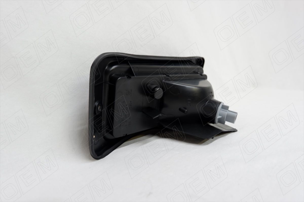 Фонарь противотуманный правый Mitsubishi Pajero Sport 1 (1999-2008) oem0019ptfzr O.E.M.